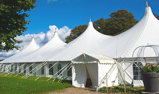 high-quality portable restrooms stationed at a wedding, meeting the needs of guests throughout the outdoor reception in Erie